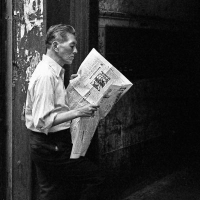 Man Reading a Newspaper